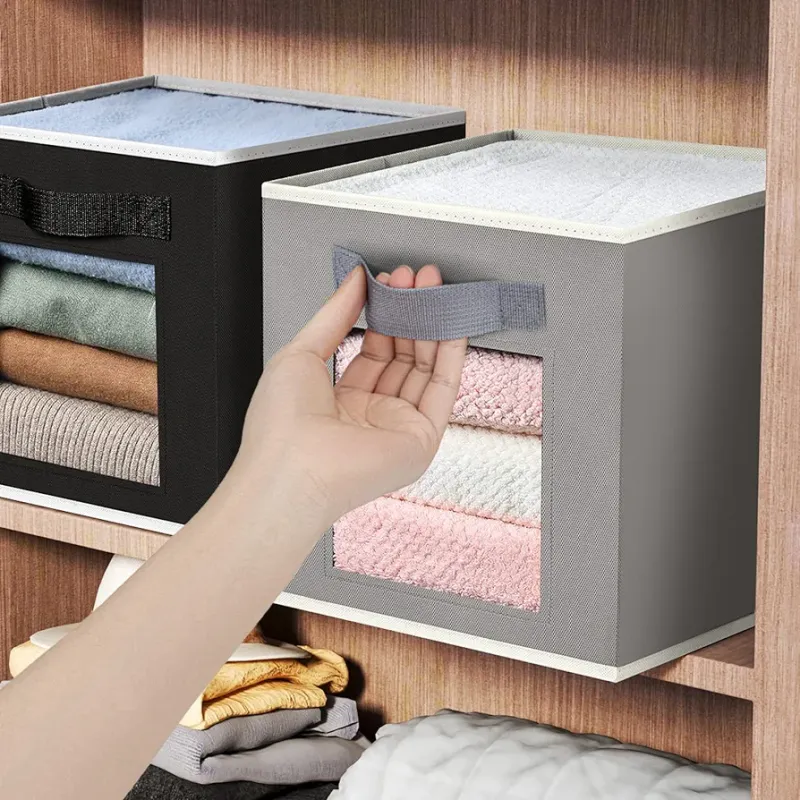 Foldable storage box with handle